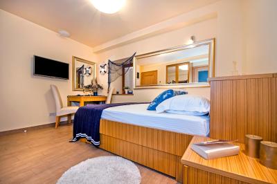Кровать в номере Guest House Golden Goose